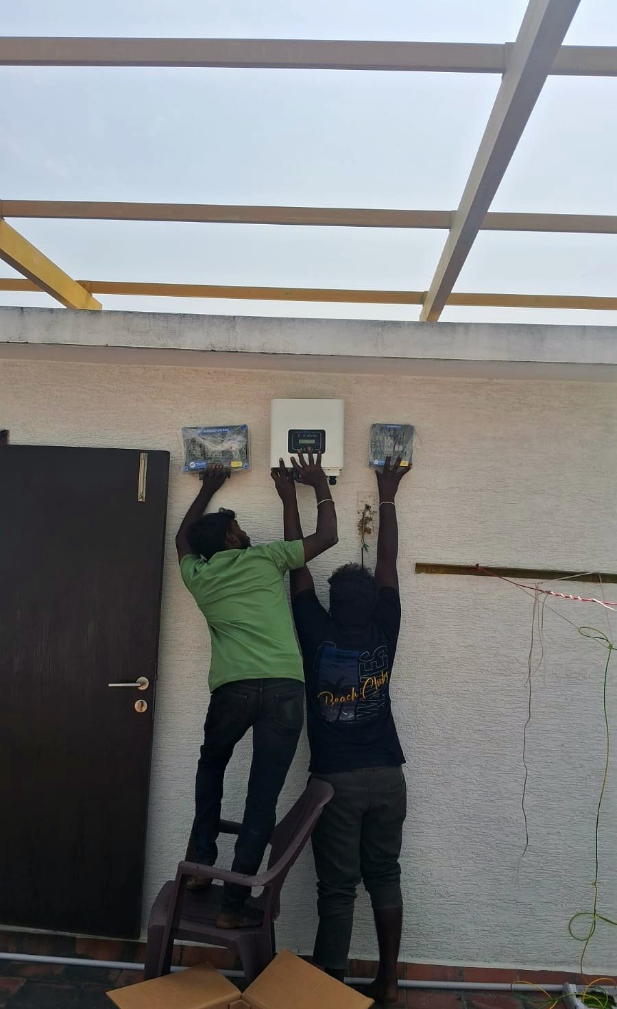 Joyline team installing solar mounting